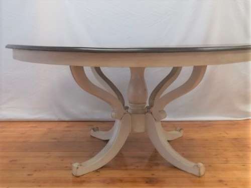 A stunning large dark wood and white base round dining table (167cm x 76cm). Xmas sale