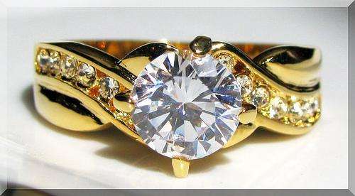 1.85 CTW SUBLIME CROSSOVER DIAMOND ENGAGEMENT RING BEAUTIFULLY ACCENTED WITH 14 SIDESTONES - SIZE 9
