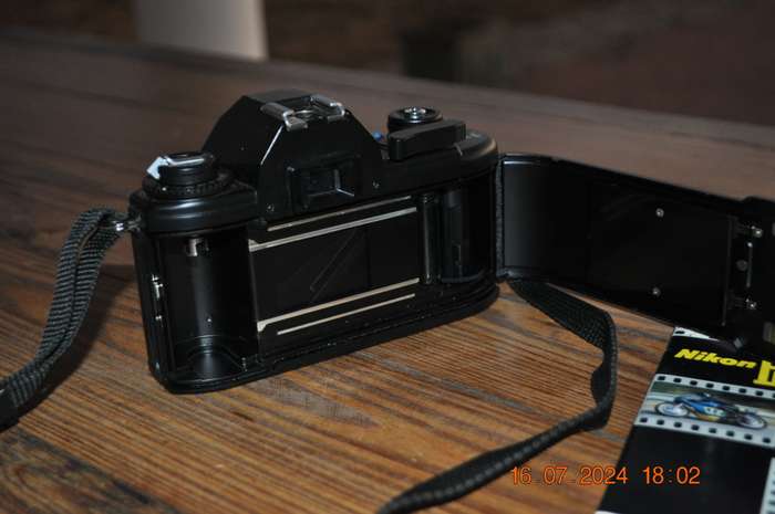 Nikon EM 35mm Film Camera Body Only (like new with manuals)