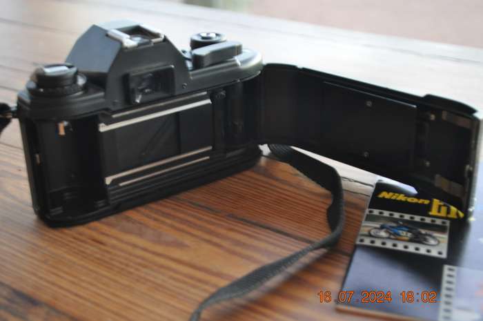Nikon EM 35mm Film Camera Body Only (like new with manuals)