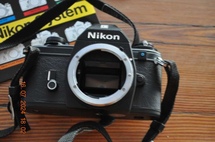 Nikon EM 35mm Film Camera Body Only (like new with manuals)