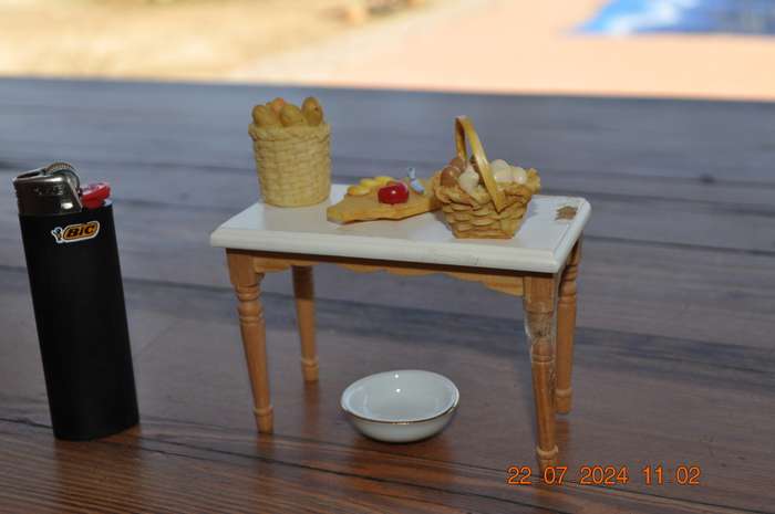 Dolls house kitchen table with extras