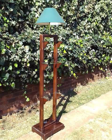 Very cool 1970`s, tall wooden lamp with three glass shelves.