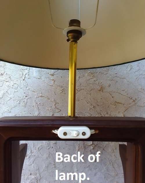 Very cool 1970`s, tall wooden lamp with three glass shelves.