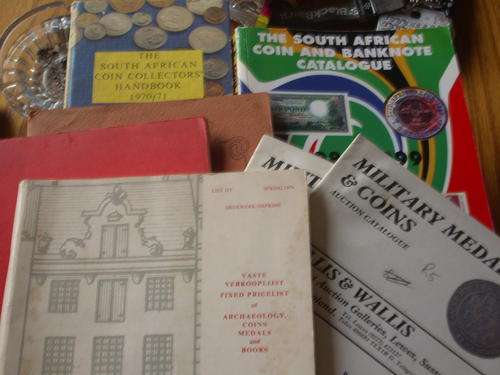 Lot of 7 coin books SA 1999 SA 1970/71