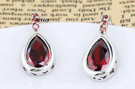 STRIKING GARNET CZ DANGLING STUDS