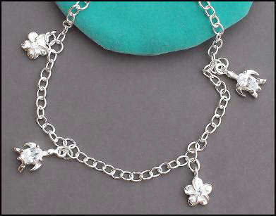 ADORABLE FINE CHARM BRACELET - 925 STERLING SILVER
