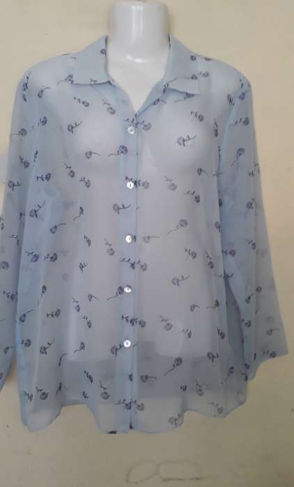 VINTAGE CLOTHING: LIGHT BLUE SHEER FLOWERED TOP WITH BLING - SIZE 34 - VERY GOOD