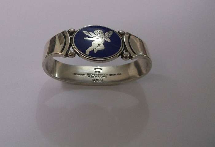 WOW !!! AN AWESOME RARE SOLID STERLING SILVER GEORG JENSEN NAPKIN RING WITH ENAMELED CHERUB MOTIF
