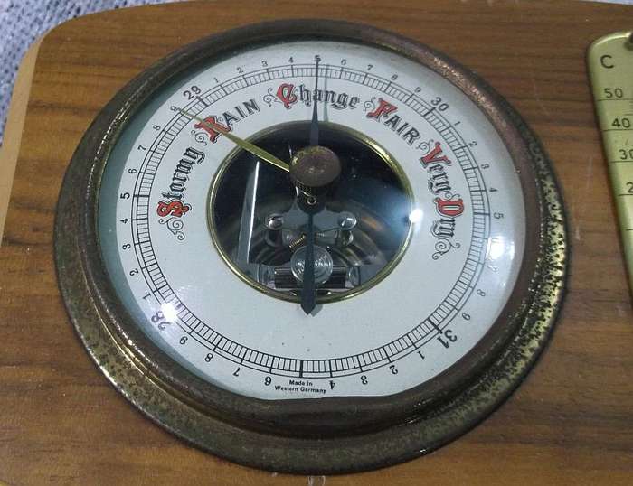 WOW !!TWO VINTAGE BAROMETERS MADE IN WESTERN GERMANY ...ONE WITH THERMOMETER...BID FOR BOTH !!!