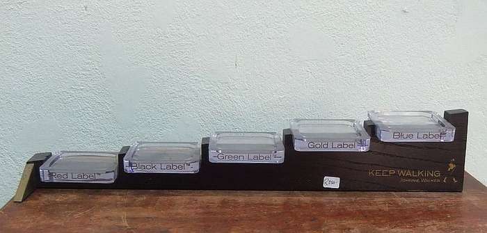 A RARE VINTAGE JOHNNIE WALKER WHISKEY BOTTLE DISPLAY STAND