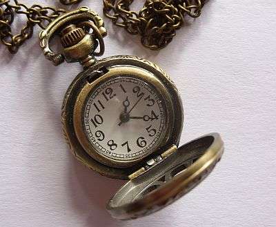 NEVER USED LADIES POCKET WATCH ON NECKLACE
