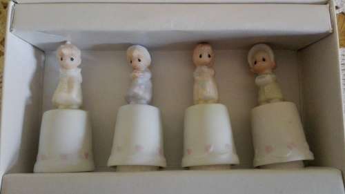 4 Boxed Enesco Precious Moments Four seasons limited edition thimbles.