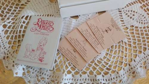 4 Boxed Enesco Precious Moments Four seasons limited edition thimbles.