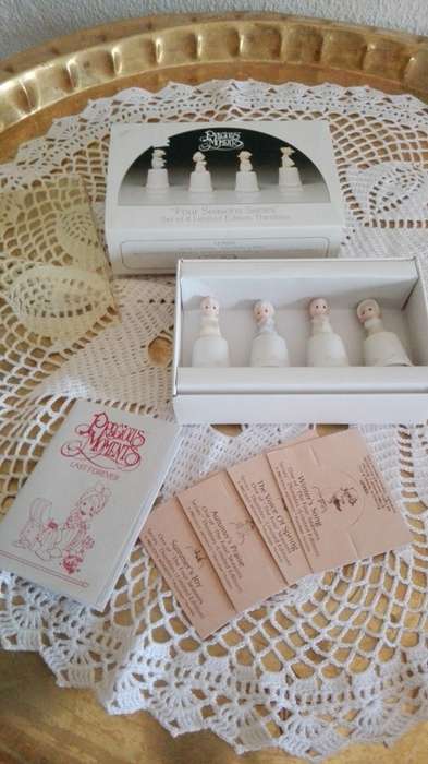 4 Boxed Enesco Precious Moments Four seasons limited edition thimbles.