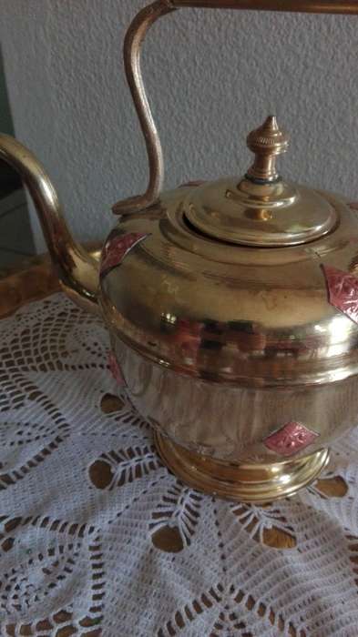 Stunning copper kettle with red copper insets