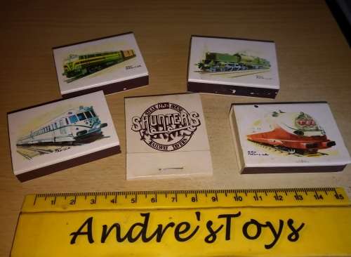 Empty Match boxes with trains on