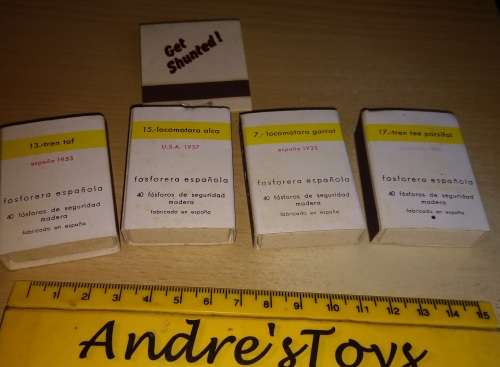 Empty Match boxes with trains on
