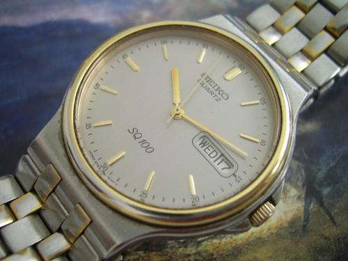 SEIKO QUARTZ DAY DATE SQ100 2T0NE MANS WATCH