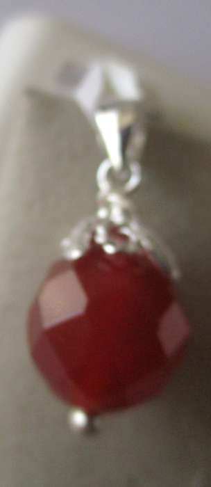925 Sterling Silver and Faceted Carnelian Pendant.