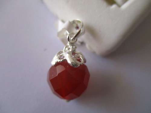 925 Sterling Silver and Faceted Carnelian Pendant.