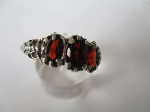 925 Sterling Silver  and genuine Garnets Ring