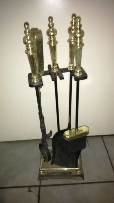 vintage fire place set on stand with coal scuttle