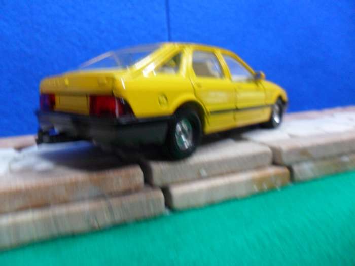 RARE CORGI 299 FORD SIERRA 2.3 GHIA ( MADE IN GT BRITAIN ) MINT WITH FAIR TO POOR ORIGINAL BOX