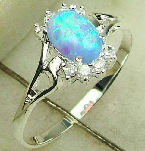 MARYKAY - GORGEOUS BLUE FIRE OPAL RING SET IN STERLING SILVER