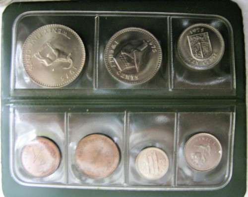 UN CIRCULATED SET OF "COINS OF RHODESIA" IN GOOD CONDITION