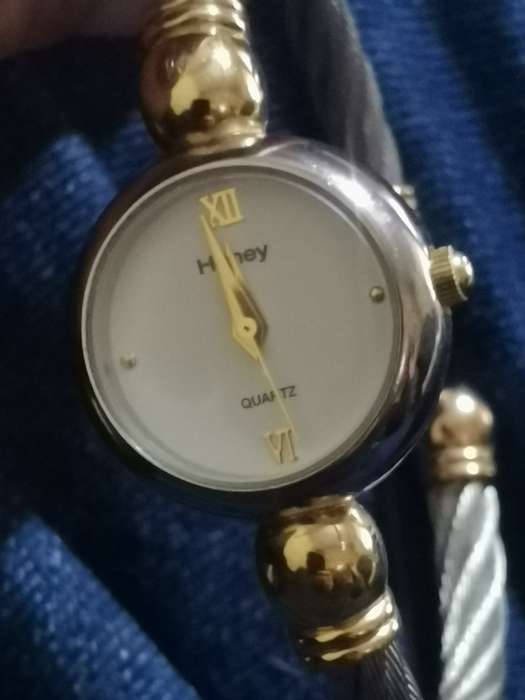 UNIQUE AND STUNNING HONEY LADIES BANGLE WATCH IN EXCELLENT WORKING CONDITION