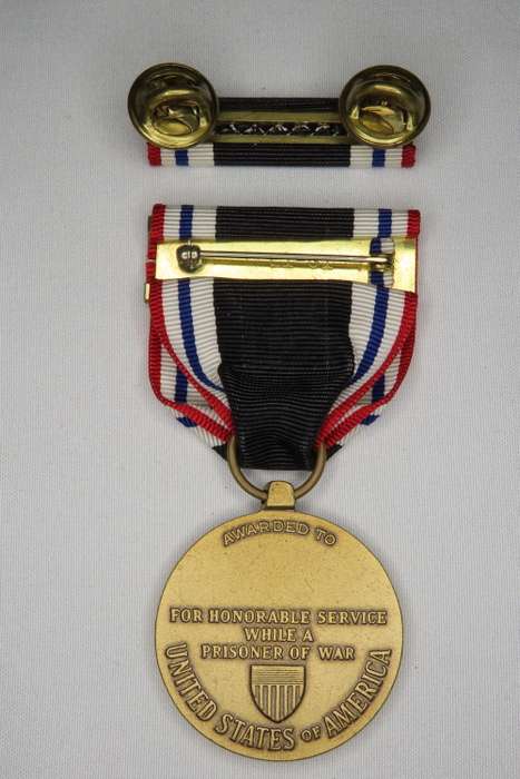 Prisoner of War Medal, in original box with Ribbon and Bar, USA POW Medal