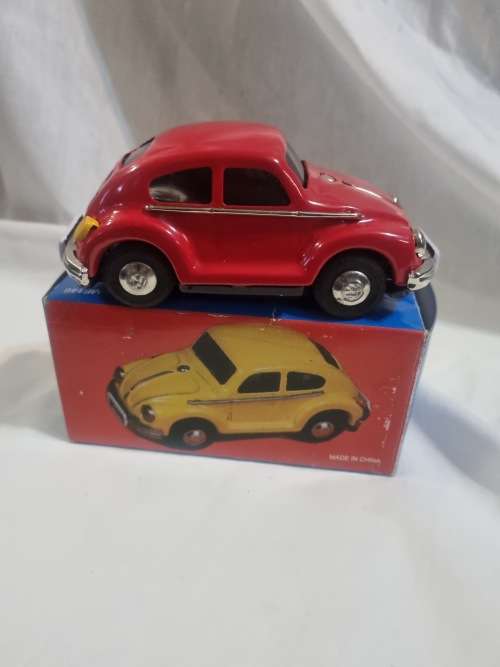Red tinplate vw car