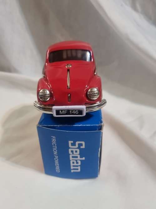 Red tinplate vw car