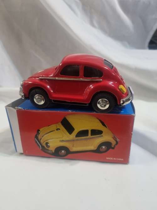 Red tinplate vw car