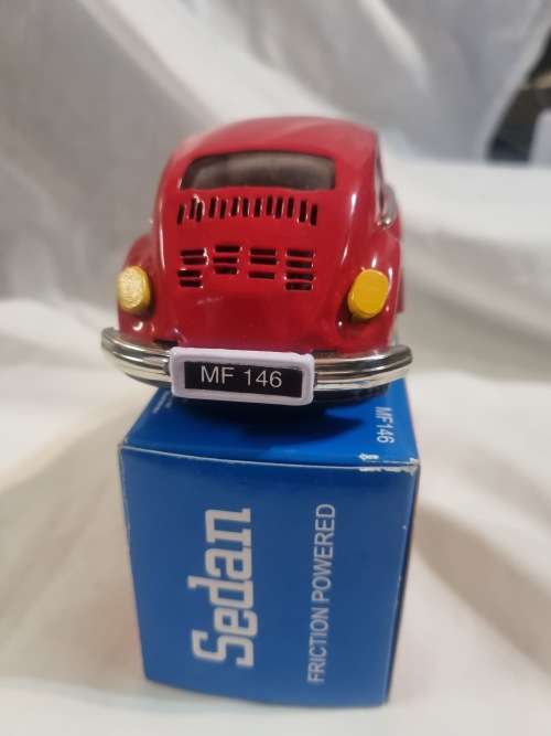 Red tinplate vw car