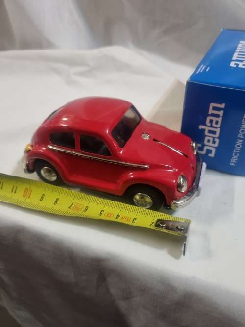 Red tinplate vw car