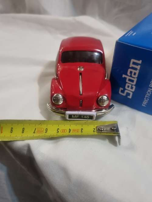 Red tinplate vw car