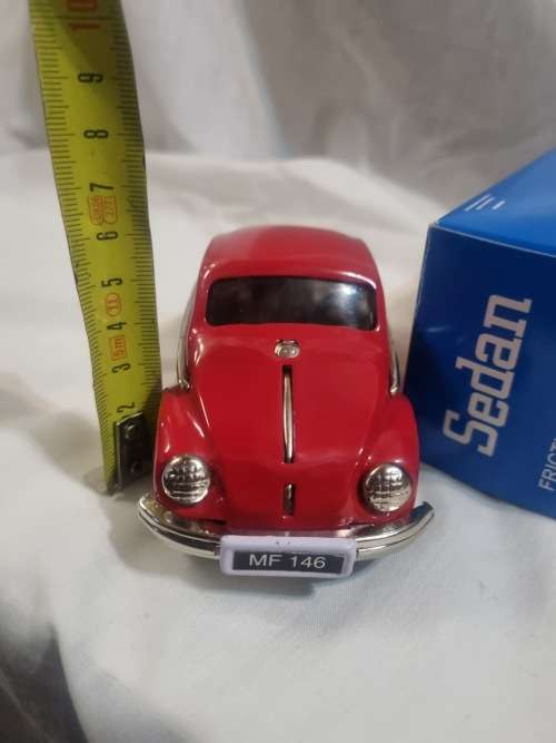 Red tinplate vw car