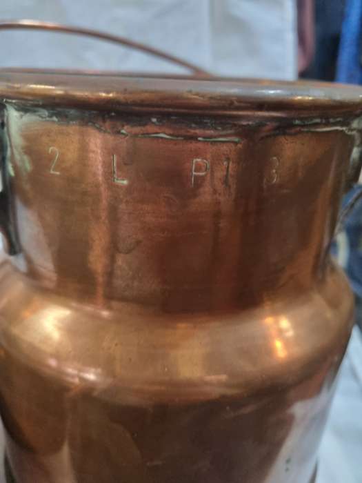 Copper/Copper plated ?? milk can