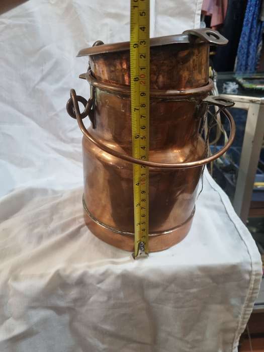 Copper/Copper plated ?? milk can