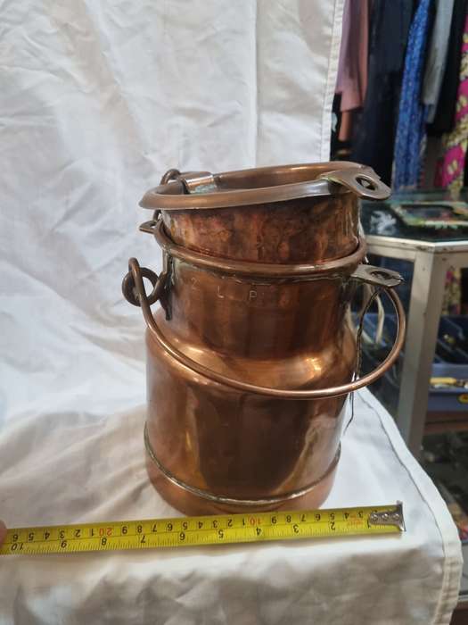 Copper/Copper plated ?? milk can