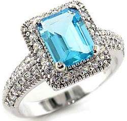 **INTERNATIONAL POSTAGE** 18K WHITE GOLD PLATED SIMULATED BLUE TOPAZ RING