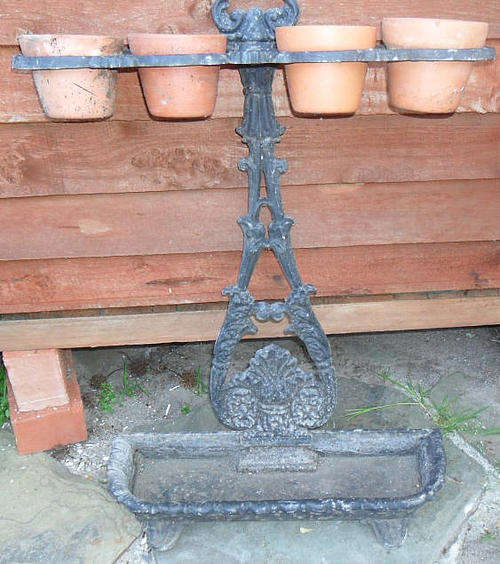 BLACK METAL ORNATE PLANT STAND