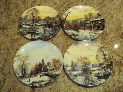 A SET OF ROYAL DOULTON COLLECTORS PLATES