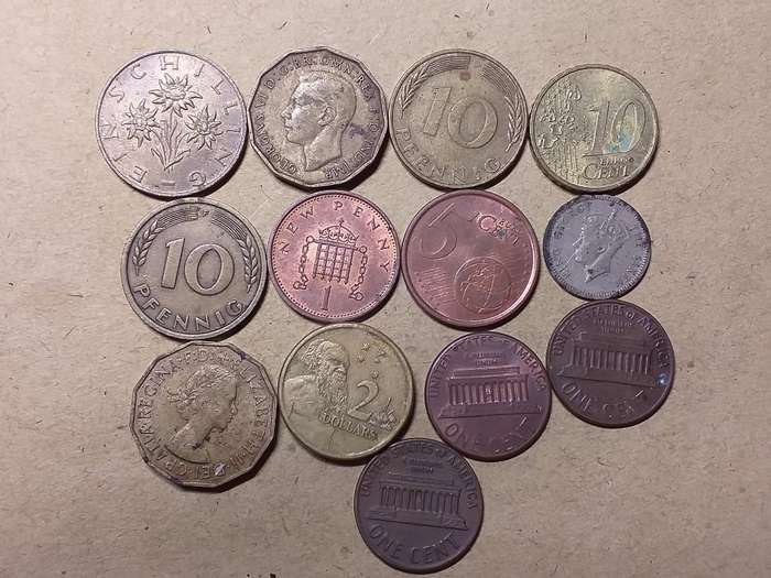 A LOT OF 13 INTERNATIONAL COINS