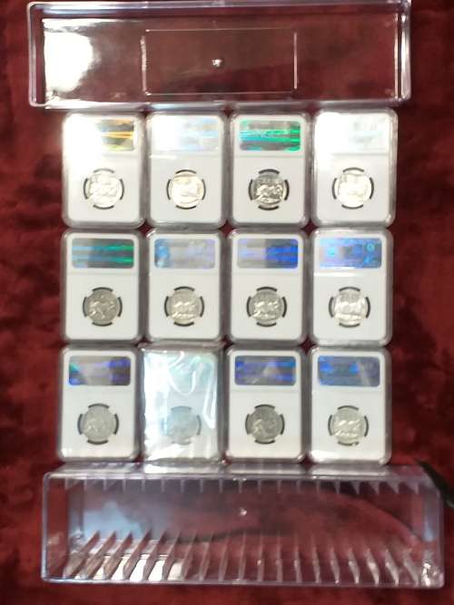 A SET OF 12 x 2000 RSA R5 COINS - MANDELA - NGC GRADED XF 40 TO MS 66 - IN PLASTIC BOX - RARE GRADES