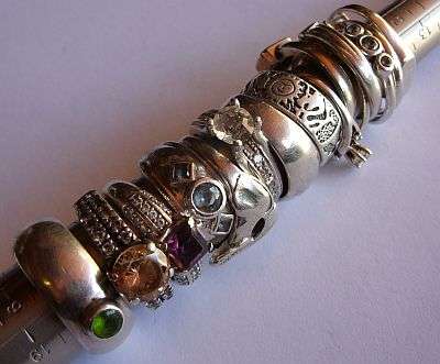 HOLY SMOKES !!! 15 STERLING SILVER RINGS SET WITH VARIOUS GEMS - ALL FOR ONE BID