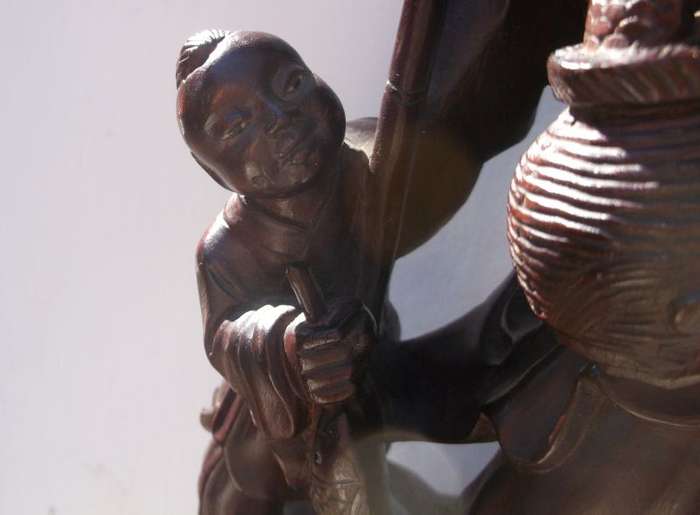 A RARE ORIENTAL ANTIQUE HAND CARVED WOODEN STATUE OF A FISHERMAN WITH HIS APPRENTICE ...AWESOME !!!!