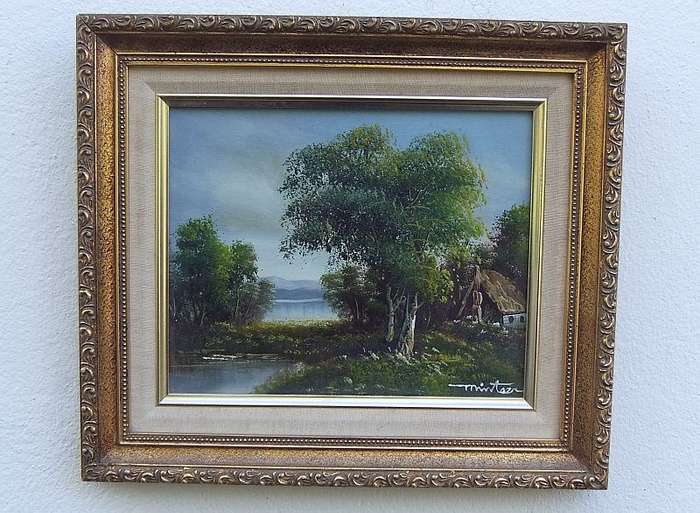 A Vintage original oil on board depicting a tranquil river scene signed by the artist ...Stunning !!